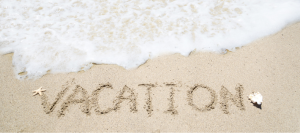 Vacation written in the sand